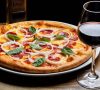What Wine Goes With Pizza: A Sommelier’s Guide to the Perfect Pairing